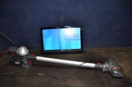 A TOSHIBA 22DV501B 22in TV (no remote or stand) (PAT pass and working) and a Hoover Freedom cordless