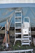FOUR ALUMINIUM STEP LADDERS and some garden tools