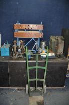 A COLLECTION OF TOOLS including two pairs of axle stands, a Workmate, two 'Jerry' cans, a sack