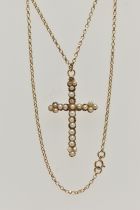 AN EARLY 20TH CENTURY SEED PEARL CROSS PENDANT AND A 9CT GOLD CHAIN, a rose metal cross set with