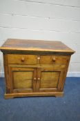 A 19TH CENTURY PINE CABINET, with two drawers above two cupboard doors, width 107cm x depth 64cm x