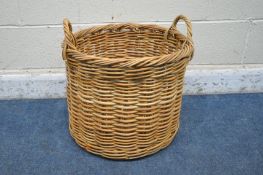 A CYLINDRICAL WICKER TWIN HANDLE LOG BASKET, diameter 49cm x height 47cm (condition report: good)