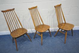 A SET OF THREE ERCOL ELM AND BEECH GOLDSMITH CHAIRS (condition report: frames with slight wobble,