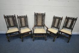 A SET OF FIVE 20TH CENTURY OAK DINING CHAIRS, including one carver, with twin finials, flanking a