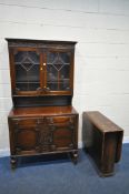 A 20TH CENTURY OAK DRESSER, the top with double glazed doors, enclosing two adjustable shelves,