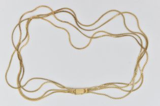 A YELLOW METAL NECKLACE, comprised of four s link chains, fitted together with a push pin box