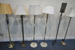 SIX VARIOUS STANDARD LAMPS, to include a pair of brass and onyx lamps, all with shades (condition