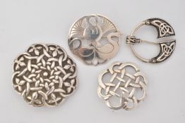 FOUR CELTIC PATTERN BROOCHES, to include a large Celtic pattern circular brooch, fitted with a