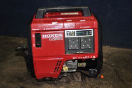 A HONDA EX800 PORTABLE PETRO GENERATOR with 240v outlets ( engine pulls freely but hasn't been