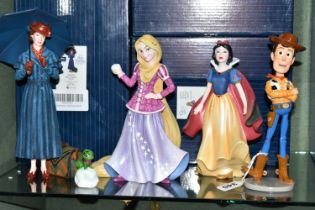 FOUR BOXED ENESCO DISNEY SHOWCASE FIGURES, comprising Rapunzel with Pascal (two figures in one) no