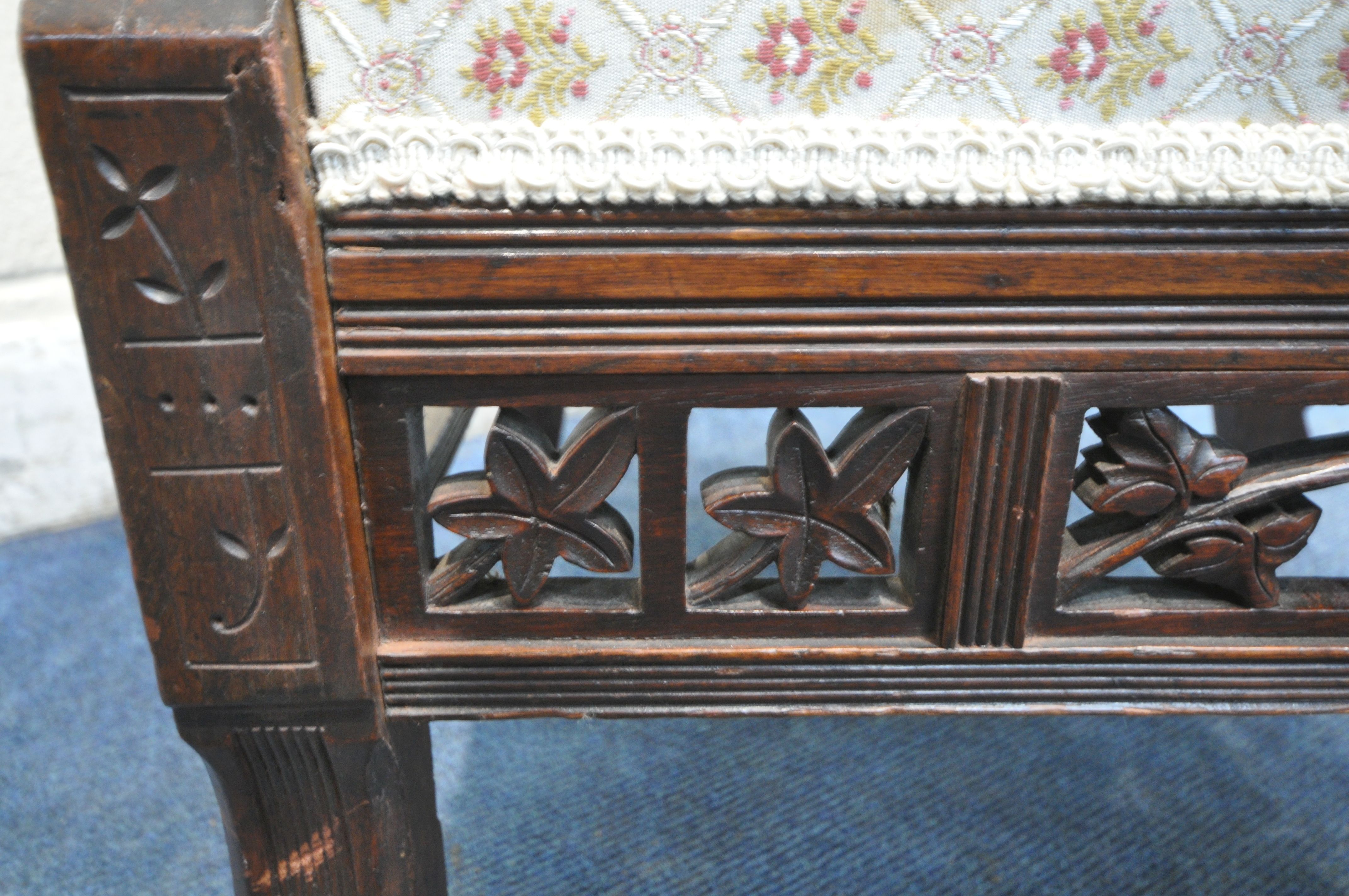 IN THE MANNER OF CHRISTOPHER DRESSER, AN EDWARDIAN WALNUT CORNER CHAIR, with beige and floral - Image 4 of 6