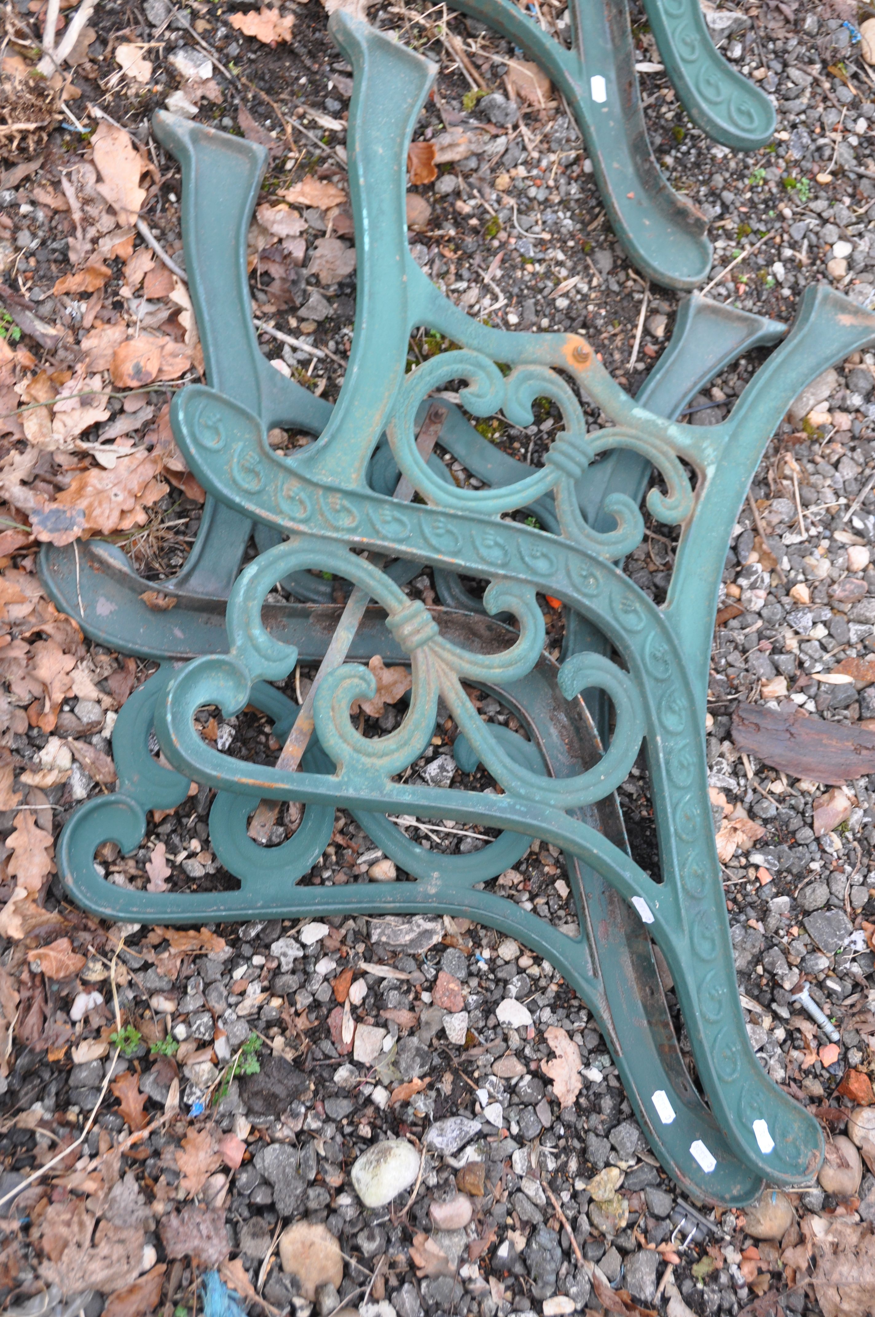 THREE PAIRS OF MODERN CAST IRON BENCH ENDS with green paint scrolled detail - Image 2 of 4