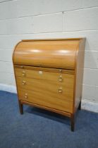 A MID CENTURY TEAK CYLINDER BUREAU, with a fitted interior and brushing slide, above three