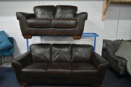 A SOFITALIA BROWN LEATHER THREE PIECE LOUNGE SUITE, comprising a three seater settee, length