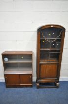 A 20TH CENTURY OAK BOOKCASE, with an arched top, astragal glazed door, on bulbous supports, united