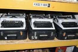 SIX ROBOTRON 'ERIKA' TYPEWRITERS, mechanical model No.105 made in GDR, with carry cases (6 + 6