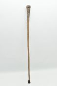A LATE 19TH CENTURY STINGRAY TAIL WALKING CANE WITH CHINESE WHITE METAL MOUNT, the mount engraved