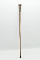 A LATE 19TH CENTURY STINGRAY TAIL WALKING CANE WITH CHINESE WHITE METAL MOUNT, the mount engraved