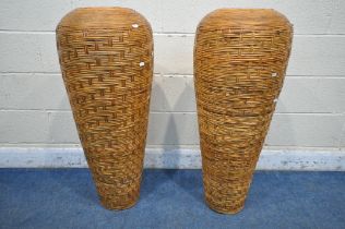 A PAIR OF WICKER AND TERRACOTTA CYLINDRICAL AND TAPERED VASES, approximate diameter 42cm x