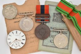 AN ASSORTMENT OF WWII MEDALS AND NATIONAL REGISTRATION IDENTITY CARDS, three service medals, a