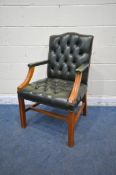 A 20TH CENTURY GAINSBOROUGH CHAIR, with green buttoned leather upholstery, width 64cm x depth 64cm x