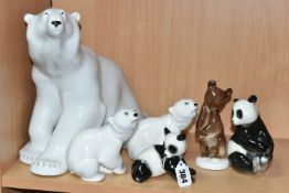 A GROUP OF LOMONOSOV POLAR BEARS AND OTHER ANIMALS, comprising a large Polar Bear, height 27cm x