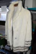 A LADIES VINTAGE WHITE FUR JACKET, 'Polar White Mink' jacket with pale brown fur detail around cuffs
