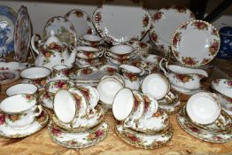 A NINETY SEVEN PIECE ROYAL ALBERT OLD COUNTRY ROSES DINNER SERVICE AND GIFTWARE, comprising a