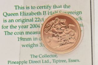 A 2004 ELIZABETH II, 22CT GOLD HALF SOVEREIGN COIN, 3.98 grams, 19mm, in blister pack with COA