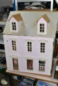 A MODERN WOODEN DOLLS HOUSE, modelled as a two storey villa, front opens to reveal two rooms over