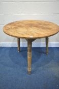 A 19TH CENTURY PINE CRICKET TABLE, incorporating various timbers, diameter 92cm x height 72cm (