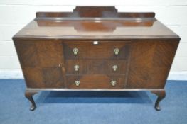 A 20TH CENTURY MAHOGANY SIDEBOARD, with a raised back, fitted with three drawers, flanked by