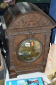 A LARGE VICTORIAN GONG STRIKING TABLE CLOCK, oak cased, with three keys and pendulum, strikes on the