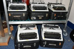 FIVE ROBOTRON 'ERIKA' TYPEWRITERS, mechanical model No.105 made in GDR, with carry cases (5 + 5