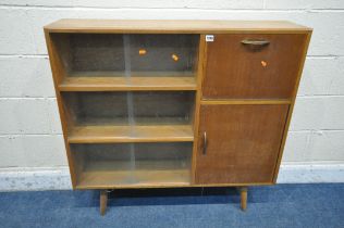 A 20TH CENTURY OAK CABINET, with three sets of double glazed doors, a fall front door above a single