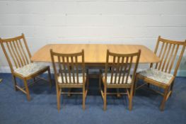 AN ERCOL ELM AND BEECH EXTENDING DINING TABLE, with a single fold out leaf, rounded ends, trestle