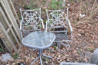A PAIR OF MODERN ALUMINIUM SWIVEL GARDEN CHAIRS and a similar rectangular glass topped table (3)