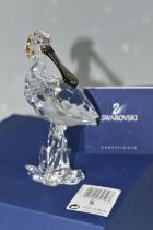 A BOXED SWAROVSKI CRYSTAL 'SPOONBILL' SCULPTURE, depicting a Spoonbill with coloured beak standing
