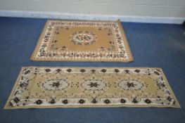 A RECTANGULAR CHINESE WOOLEN RUG, with a caramel field, central medallion and a multi strap