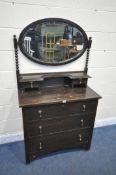 A 20TH CENTURY OAK DRESSING CHEST, with an oval mirror, bobbin turned supports, fitted with an