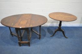 AN EARLY 20TH CENTURY OAK BARLEY TWIST GATE LEG TABLE, with a hinged storage compartment to top,