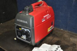 A HONDA EU20i INVERTER PETROL GENERATOR with manual (engine pulls freely but hasn't started)