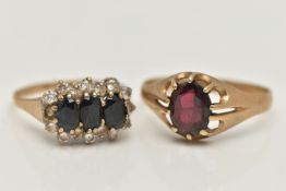 TWO 9CT GOLD RINGS, the first an oval cut garnet, prong set in yellow gold, hallmarked 9ct