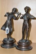 A PAIR OF CAST BRONZED METAL MUSICIAN FIGURES, comprising a female playing a violin and a male