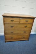 AN EDWARDIAN WALNUT CHEST OF TWO SHORT OVER THREE LONG DRAWERS, width 122cm x depth 56cm x height