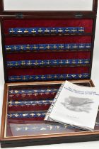 TWO 'DANBURY MINT' FRAMED SETS OF 'THE HUNDRED GREATEST COMBAT AIRCRAFT OF ALL TIME', gold plated