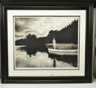 JOHN SWANNELL (BRITISH 1946) 'NUDE IN A BOAT', a signed limited edition photographic print, 2/50