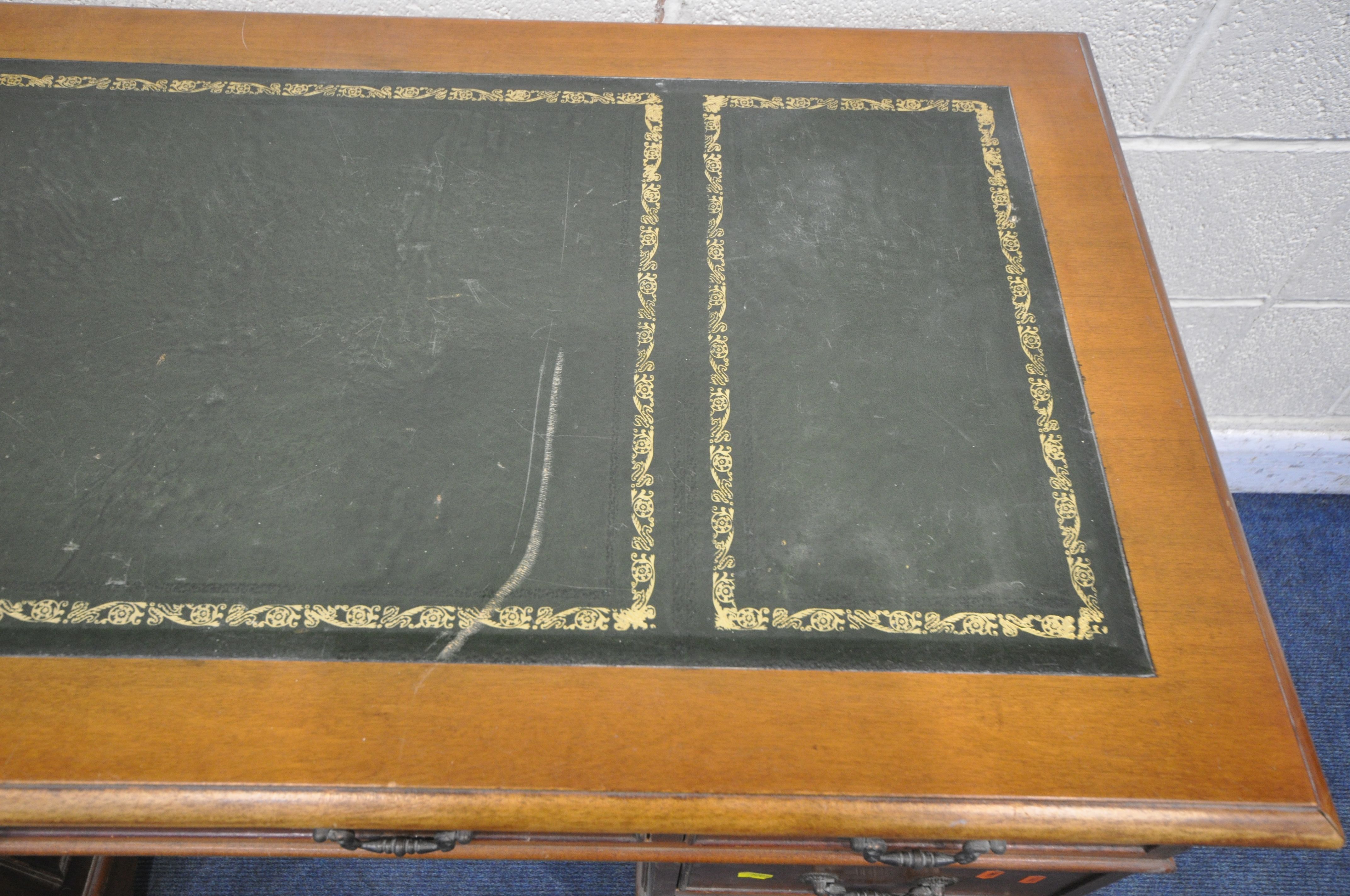 A 20TH CENTURY YEWWOOD TWIN PEDESTAL DESK, with a green tooled leather writing surface, fitted - Image 3 of 5