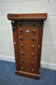 A 19TH CENTURY SEVEN DRAWER WELLINGTON CHEST, with a later added tray top, width 53cm x depth 37cm x