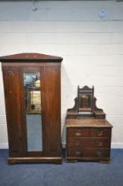 A 20TH CENTURY STAINED PINE WARDROBE, with a loose cornice and a single mirror door, width 112cm x